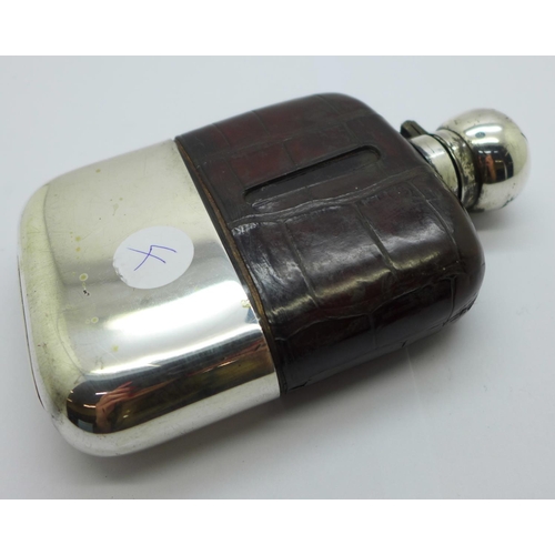 830 - A silver, glass and leather mounted spirit flask, weight of cup 74g