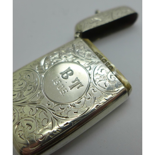 832 - A silver vesta case, with inscription dated 1905, 28g