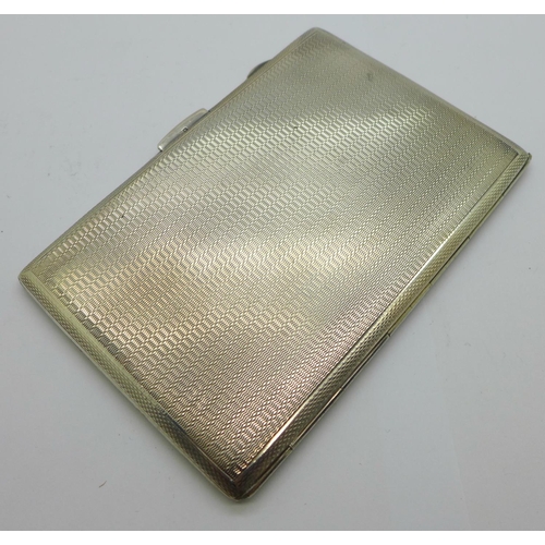 833 - A silver cigarette case, 177.5g, bears inscription