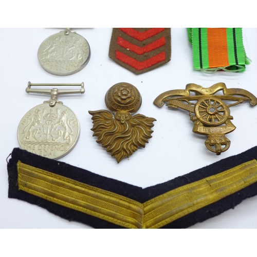 839 - Military interest including medals and cap badges