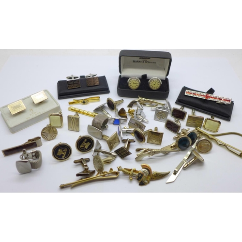 850 - A collection of cufflinks and tie-pins