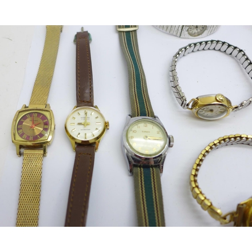 863 - A collection of lady's watches including Sekonda, Tissot, Timex, etc.