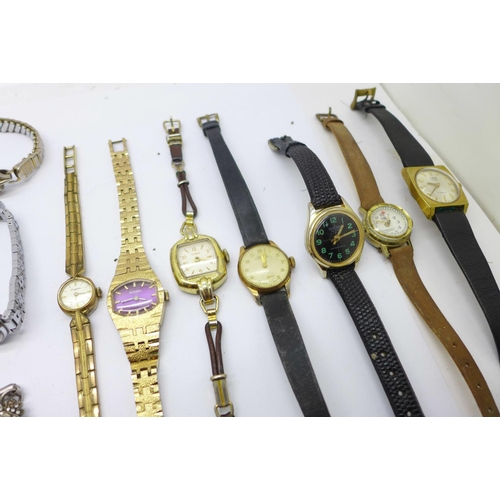 863 - A collection of lady's watches including Sekonda, Tissot, Timex, etc.