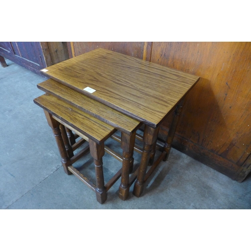 272 - An oak nest of tables