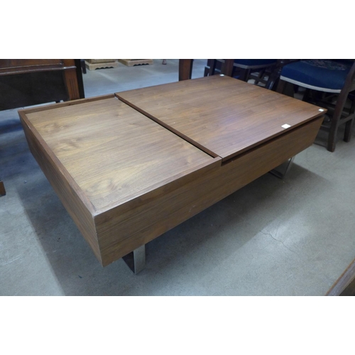 293 - A simulated oak and chrome metamorphic coffee table