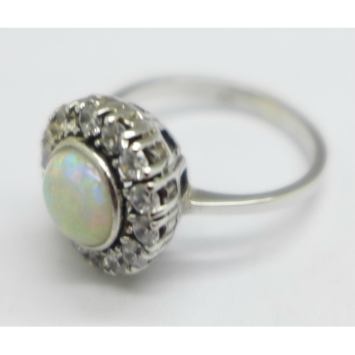 939 - A 14ct white gold, opal and white stone cluster ring, 4.5g, M, diameter 12mm