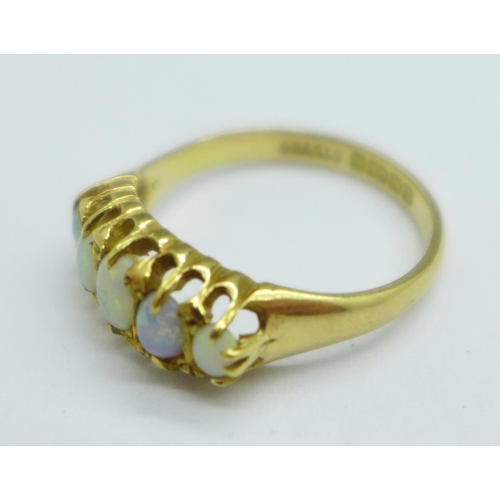 945 - An 18ct gold and five stone opal ring, Birmingham 1925, 3.8g, Q