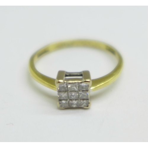 949 - An 18ct gold, nine stone diamond ring, 2.3g, M, marked 18KT