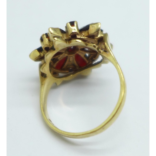 950 - A 9ct gold, garnet cluster ring, 4.8g, O