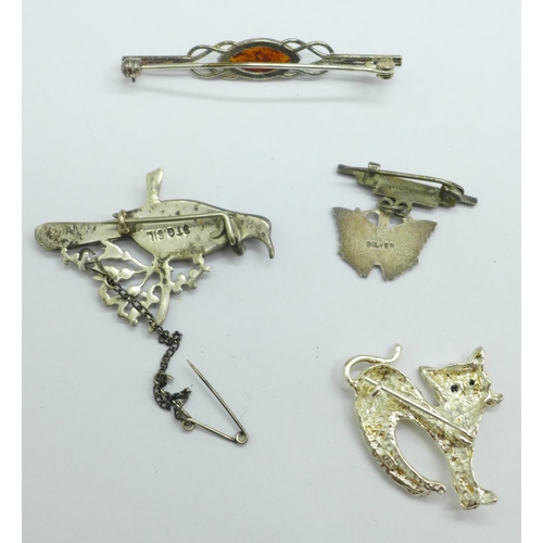 952 - Four silver brooches including an enamelled butterfly drop brooch