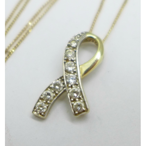 953 - A 9ct gold pendant and chain, 1.7g