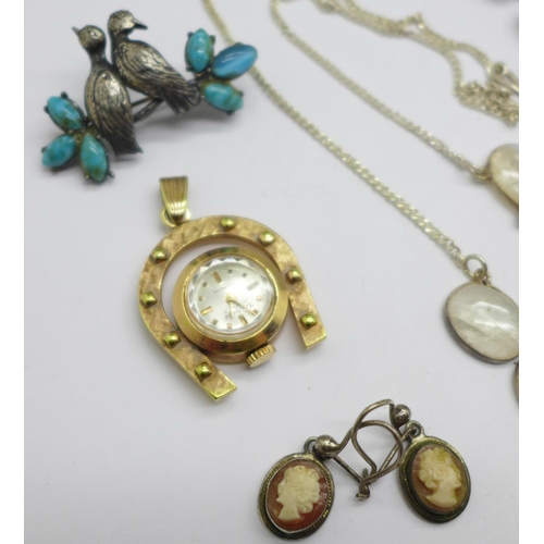 965 - An amethyst necklace and a quartz necklace, a horseshoe pendant watch, a bird brooch and a pair of c... 