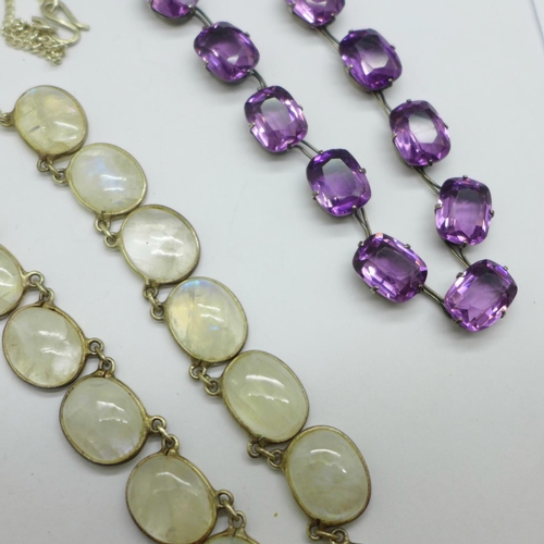 965 - An amethyst necklace and a quartz necklace, a horseshoe pendant watch, a bird brooch and a pair of c... 