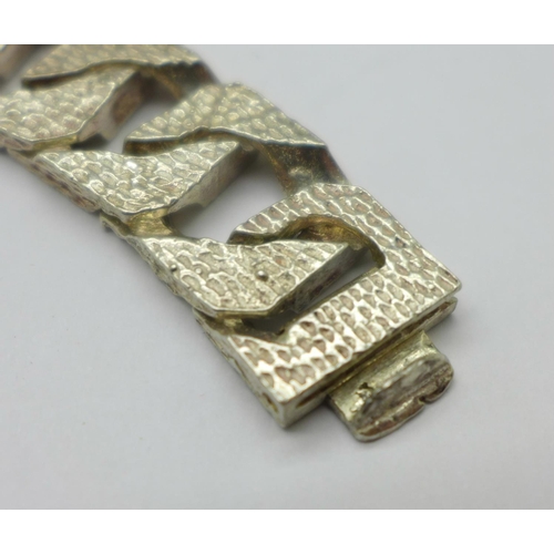 971 - A silver curb link bracelet, 85g