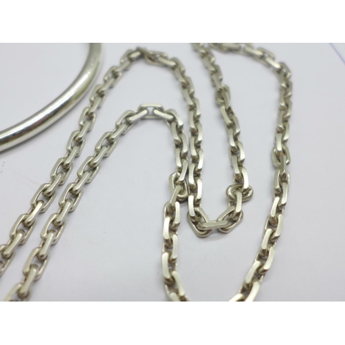 972 - A silver torq bangle and chain, 61g