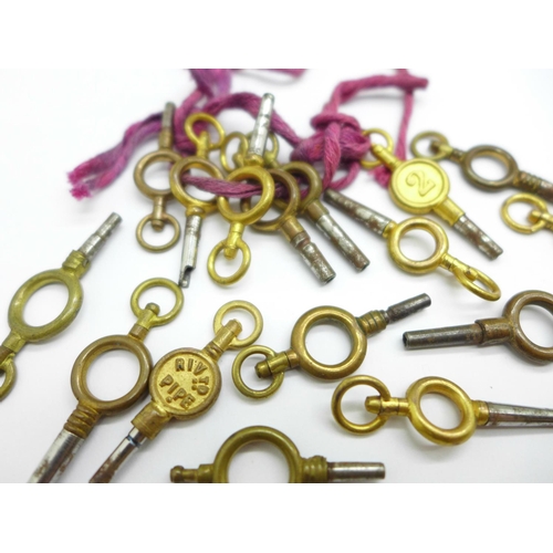 983 - Sixteen pocket watch keys