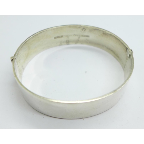 993 - A silver bangle, 36g