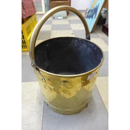 415 - An Arts and Crafts brass coal bucket