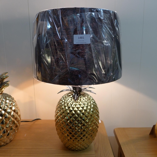 1557 - A gold ceramic pineapple table lamp with black shade (30393C19)   #