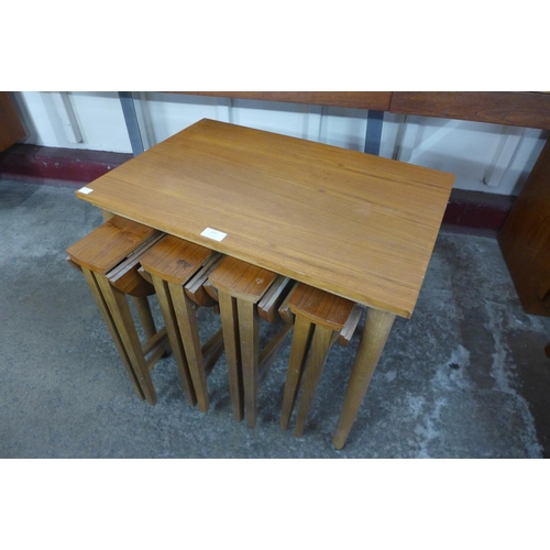 102 - A teak nest of tables