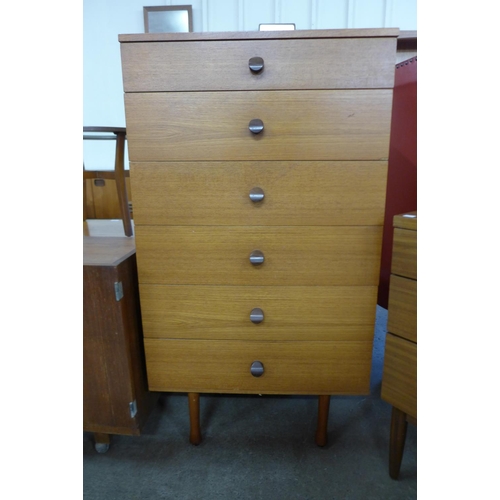 111 - A teak chest of drawers