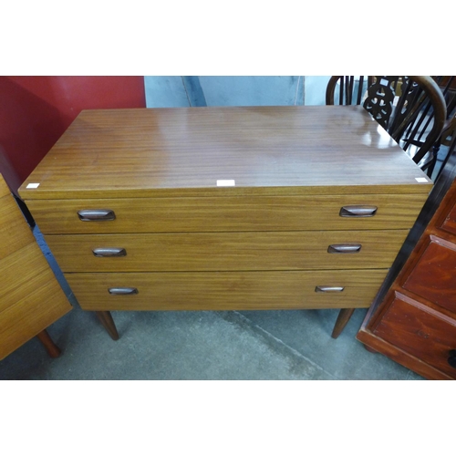 112 - A teak chest of drawers