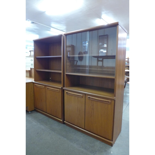 115 - A pair of teak bookcases