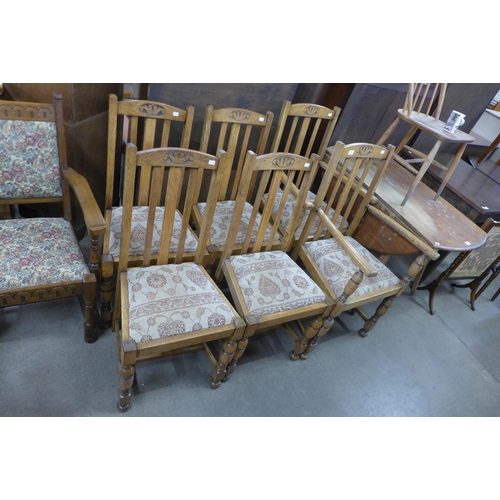 196 - A set of six oak dining chairs