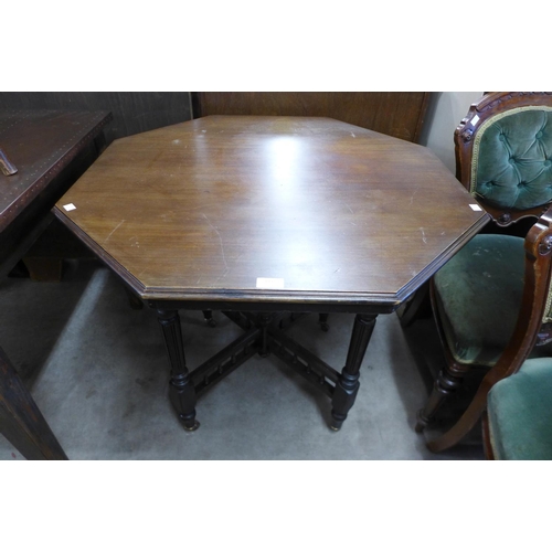 199 - A Victorian mahogany octagonal centre table