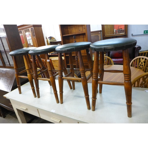 230 - A set of four beech stools