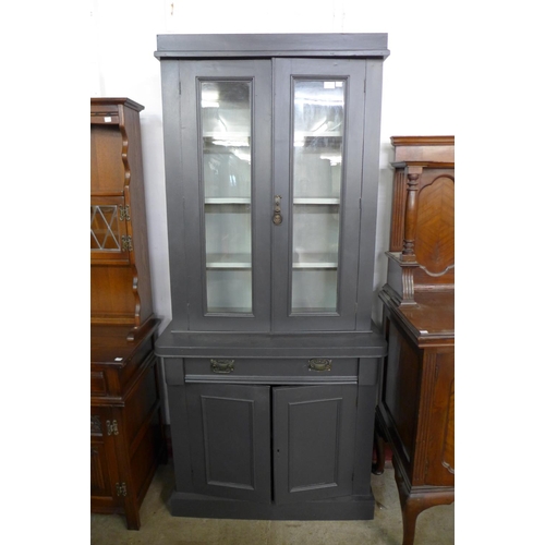 234 - A Victorian style painted four door bookcase