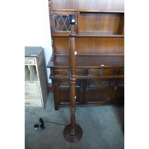 238 - A mahogany standard lamp