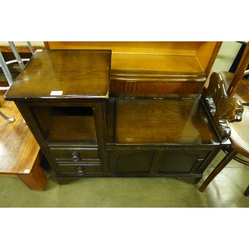 250 - An oak telephone seat