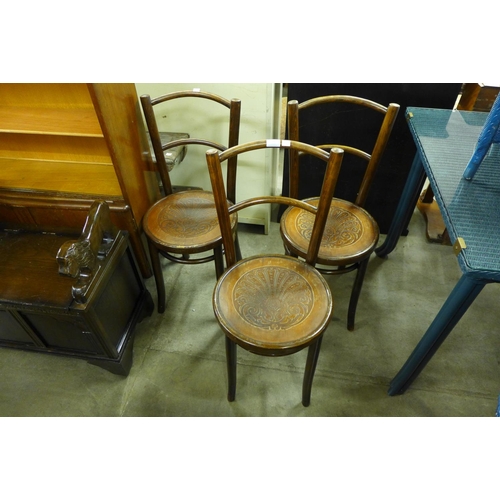 251 - A set of three beech bentwood chairs