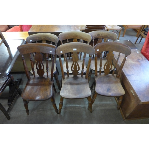 255 - A set of six Victorian elm and beech kitchen chairs