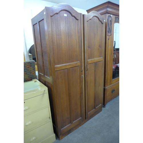 265 - A beech fitted wardrobe