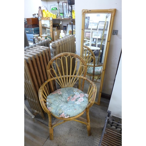 269 - A set of three bamboo swivel chairs by Angraves Invincible, Thurmaston, Leicester, a coffee table an... 