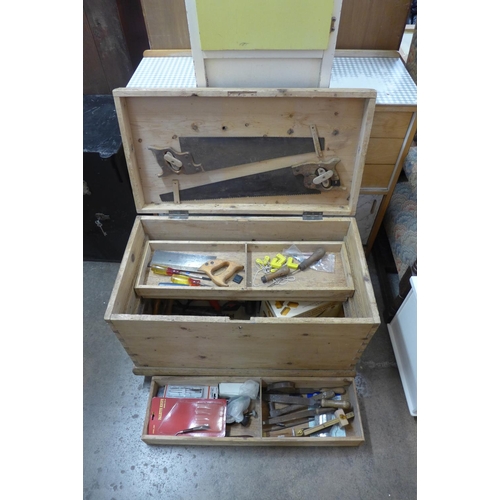 274 - A large carpenter's pine tool chest with tools