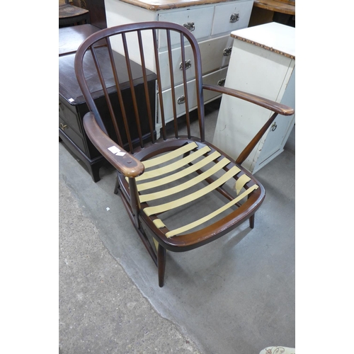 284 - An Ercol low armchair