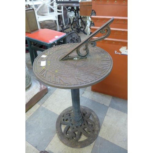 322 - A cast iron garden sun dial