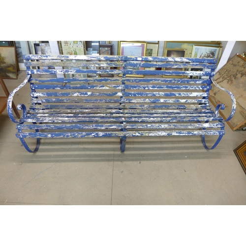 346 - A wrought iron garden bench