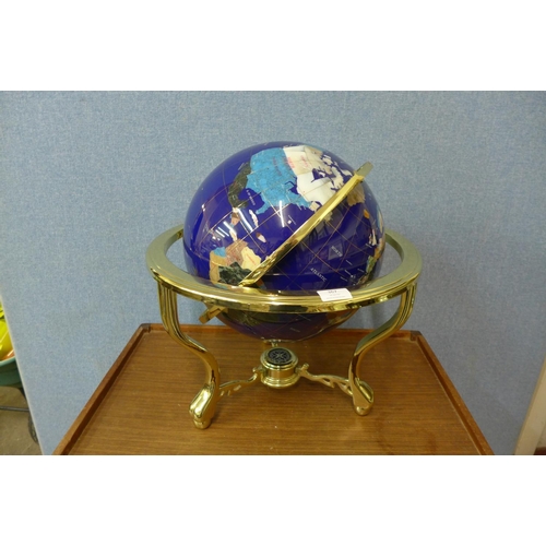 367 - A gemstone and gilt metal terrestrial globe with compass