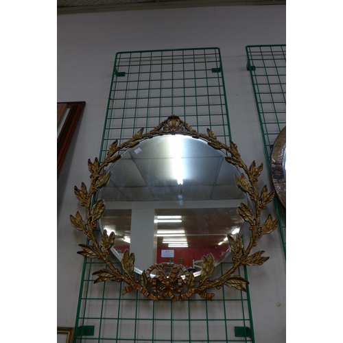 377 - A gilt metal framed mirror