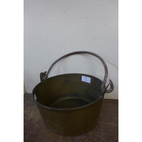 385 - A Victorian brass jam pan