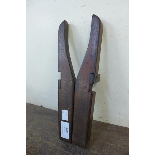 388 - A Victorian mahogany boot jack