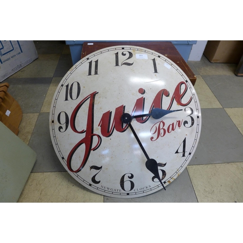 399 - A reproduction Juice Bar quartz wall clock