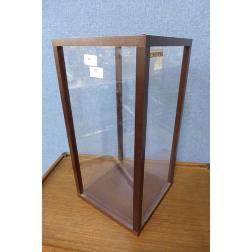 403 - A small beech and perspex display cabinet