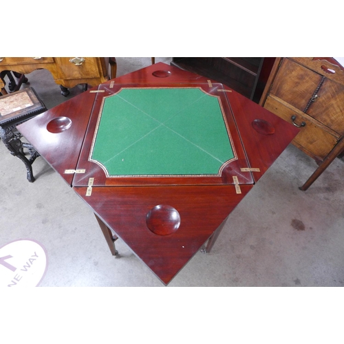 65 - An Edward VII inlaid mahogany envelope card table