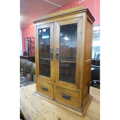 75 - A Victorian oak table top cabinet