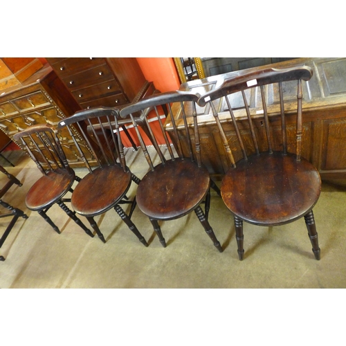 77 - A set of four Victorian beech penny seat kitchen chairs